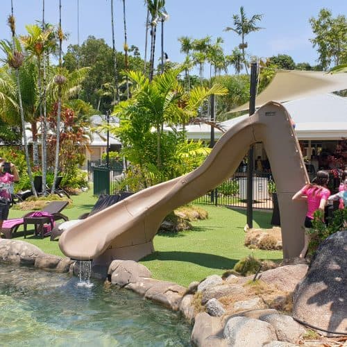 Grand Gazebos and Cubbies - Custom Pool Slide at resort